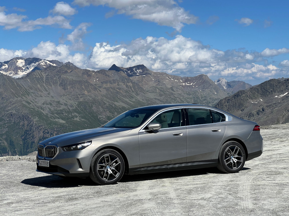 BMW i5 in mountains